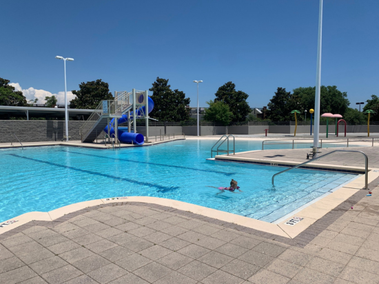 Outdoor pool with slide rental at the Taj in Destin.