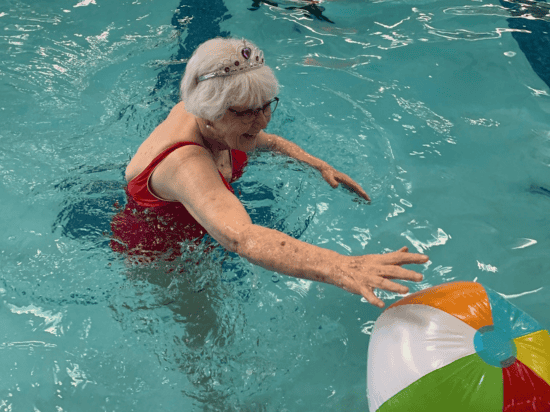 Couple doing aquacize at the Bernie pool.
